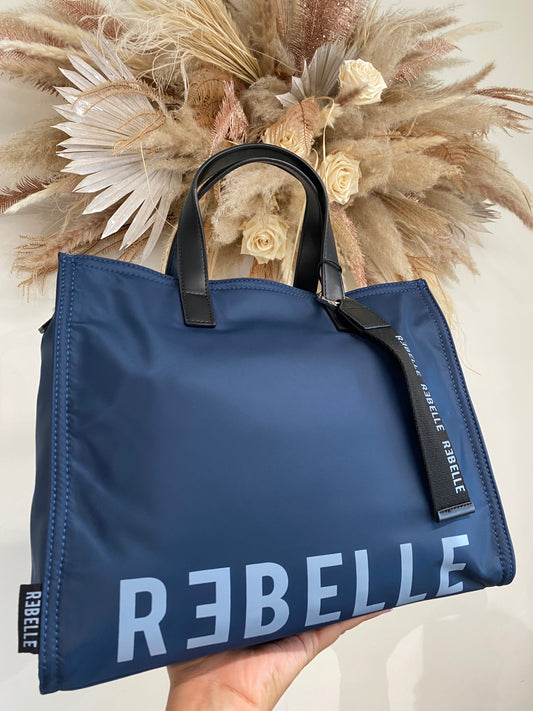 Bolso shopping Rebelle de nailon azul con bandolera